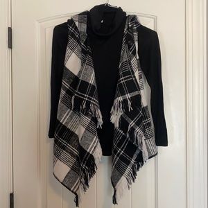 2 Buffalo plaid vests and 1 black shirt, girls size L and XL